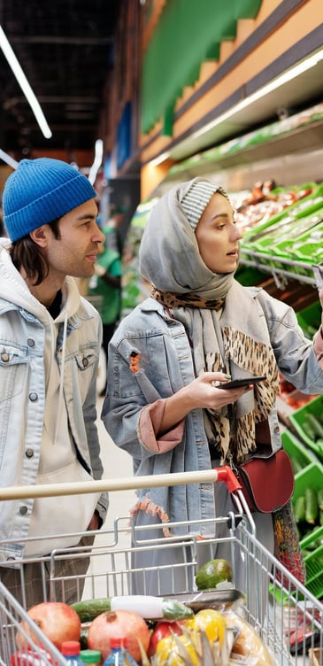 a man and woman in a grocery store