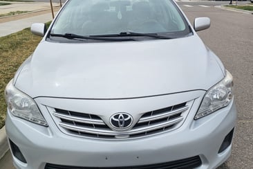 a car parked on the side of a street