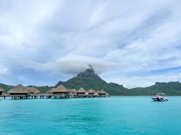 Panoramic view of the vibrant blue lagoon in Bora Bora, French Polynesia.