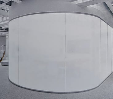 a modern office with a large window with Smart Film applied in off mode opaque