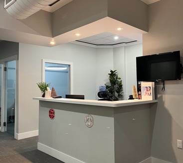 The receptionist area inside a dental office.