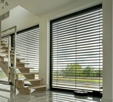 a staircase casement with blinds and blinds