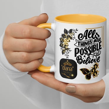 Female holding a white coffee/tea cup that is colored yellow inside