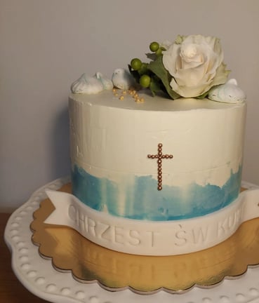 a cake with a cross on top of it