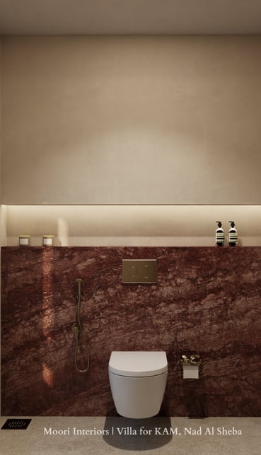 Modern bathroom featuring Emperador marble walls and a white toilet.