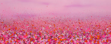 a field of flowers with a pink sky in the background