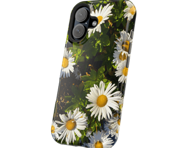Daisies Phone Case featuring a vibrant close-up of blooming white daisies with yellow centers