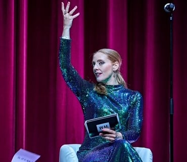 Image of Layla Claire on an opera stage during a live performance