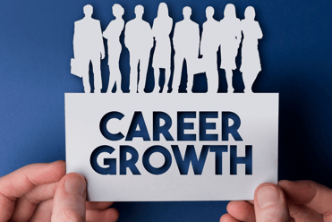 a person holding a paper cutout of a paper cutout of a career