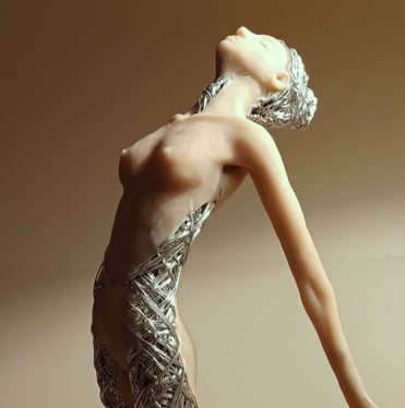 A detailed polymer clay and wire sculpture of a standing female figure, stretching with arms back