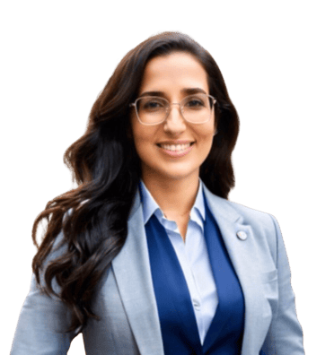 A professora Juliana Barcellos, de terno e gravata, sorrindo.