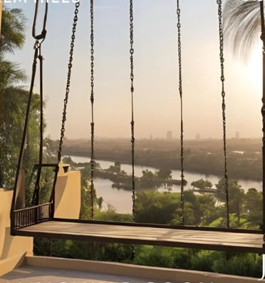 Swing with serene natural view and the Nile River in Jirian project