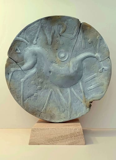 A clickable link leading to a page with further information about the sculpture 'Of Awe and Aura'. 