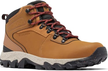 a brown and tan colored hiking boot with red laces