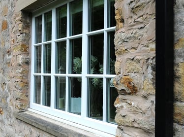 Replacement double-glazed white, multi-pane uPVC window by Steve Layfield Windows