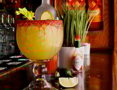 a margarita cocktail with lime and limeade