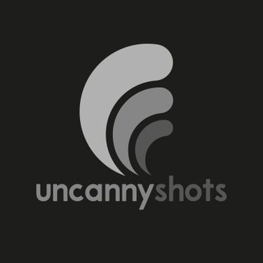 Uncannyshots logo