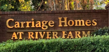 Carriage Homes at River Farm logo
