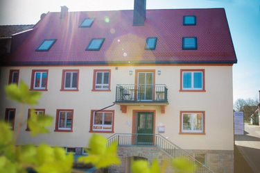 Hof Apartments Weigenheim logo