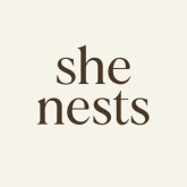 She Nests logo