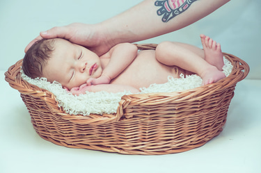 Surviving Motherhood logo
