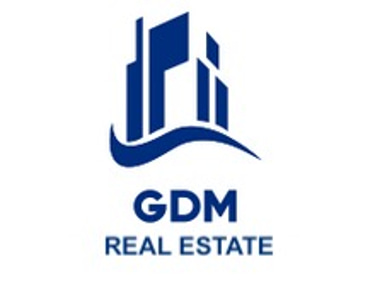 GDM REAL ESTATE logo
