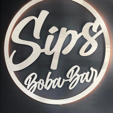 Sips Boba Bar & Deli logo