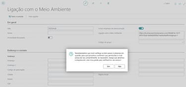 Microsoft Dynamics 365 Business Central environment connection setup screen with a Portuguese configuration popup.