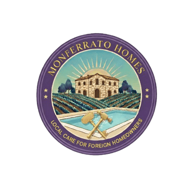 Monferrato Homes logo featuring an Italian villa, vineyard, pool, and crossed key and hammer.