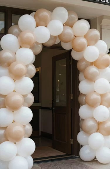 A grand balloon arch at a baptism entrance, using high-quality balloons in #A7727D and white, professional indoor lighting, joyful mood.