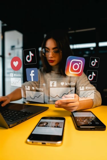 A social media manager analyzing digital marketing analytics and icons for TikTok, Instagram, and Facebook.