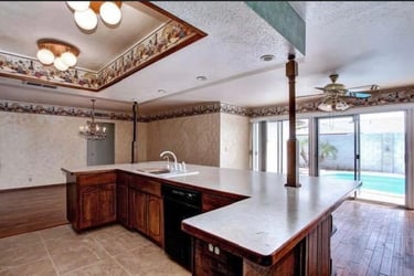 Before and after kitchen remodeling project with hardwood floors