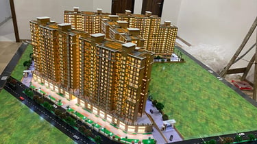 Scale model of a luxury high-rise apartment complex featuring architecture by GP Modeling 
