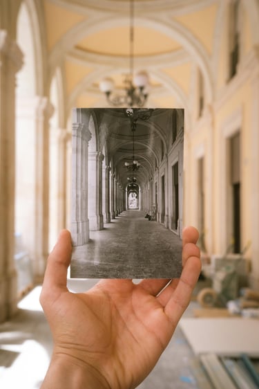 old photo held in the same space it was taken