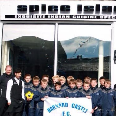 Regen Sports Therapy founder TJay Harvey pictured with the Barnard Castle F.C. youth squad.