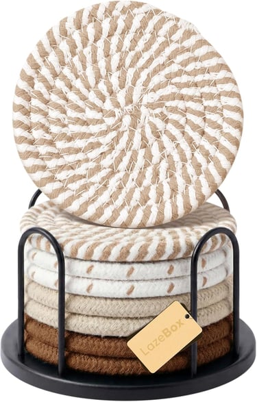 Set of 8 round drink coasters on a black holder for tabletop protection