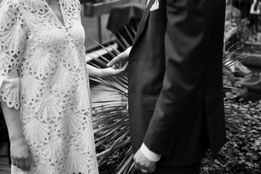 newlyweds sharing a gentle touch in Geneva