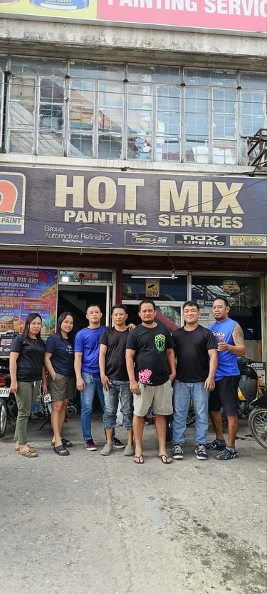 Hotmix Painting Services friendly staff engaging with customer at branch