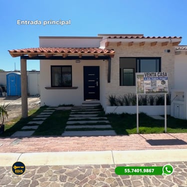 Modern single-story house for sale with a tile roof porch, stone facade, and paved driveway.