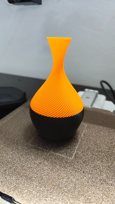 orange and black 3d printed flower pot