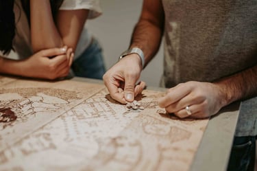 people building a puzzle