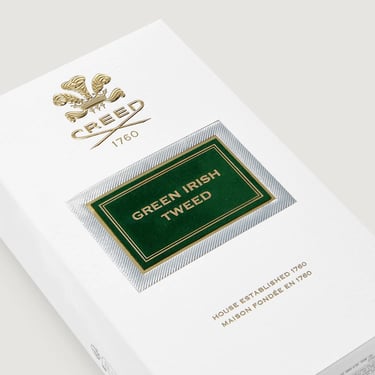 Luxury white packaging for Creed Green Irish Tweed cologne with gold and green details.