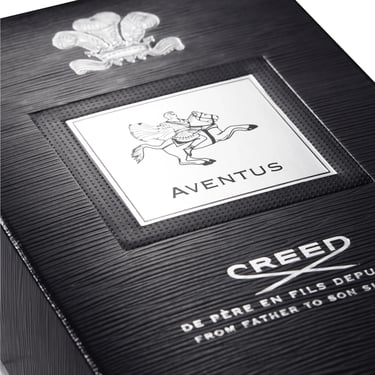 Luxury black textured box for Creed Aventus cologne featuring the silver embossed brand logo and horse rider icon.