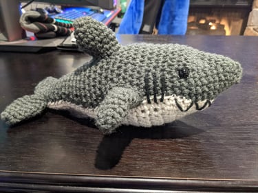 The side of a crochet shark