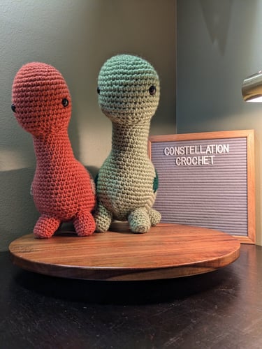 Brontosaur's one orange and one green