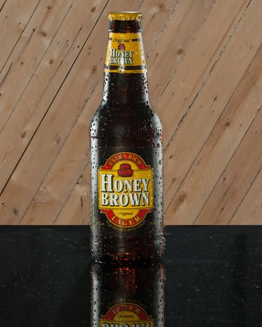 Honey Brown beer on a dark table with slated wood background. #Professional Food Photography, # Detroit Food Photographer,