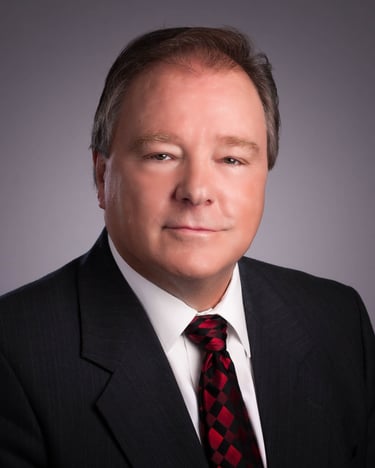 Headshot Photography at it's finest. Man in a suit on grey background. #Headshot Photography, #Detroit Commercial Photography