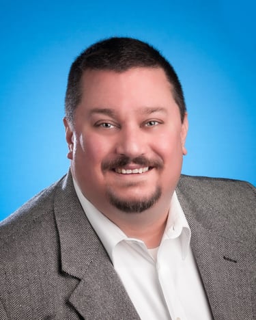 Retouched Farmers Insurance agent on Blue background. #Business Photography, #Headshot Photography, 