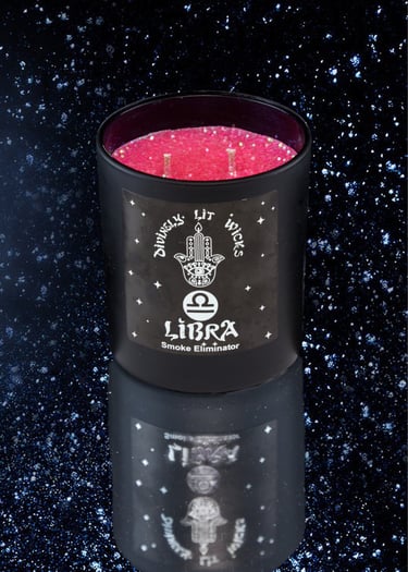 Scented red candle in a black Zodiac mug with starfield background