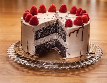 Raspberry chocolate cake with white frosting sitting on an Oak table.. #Professional Food Photography